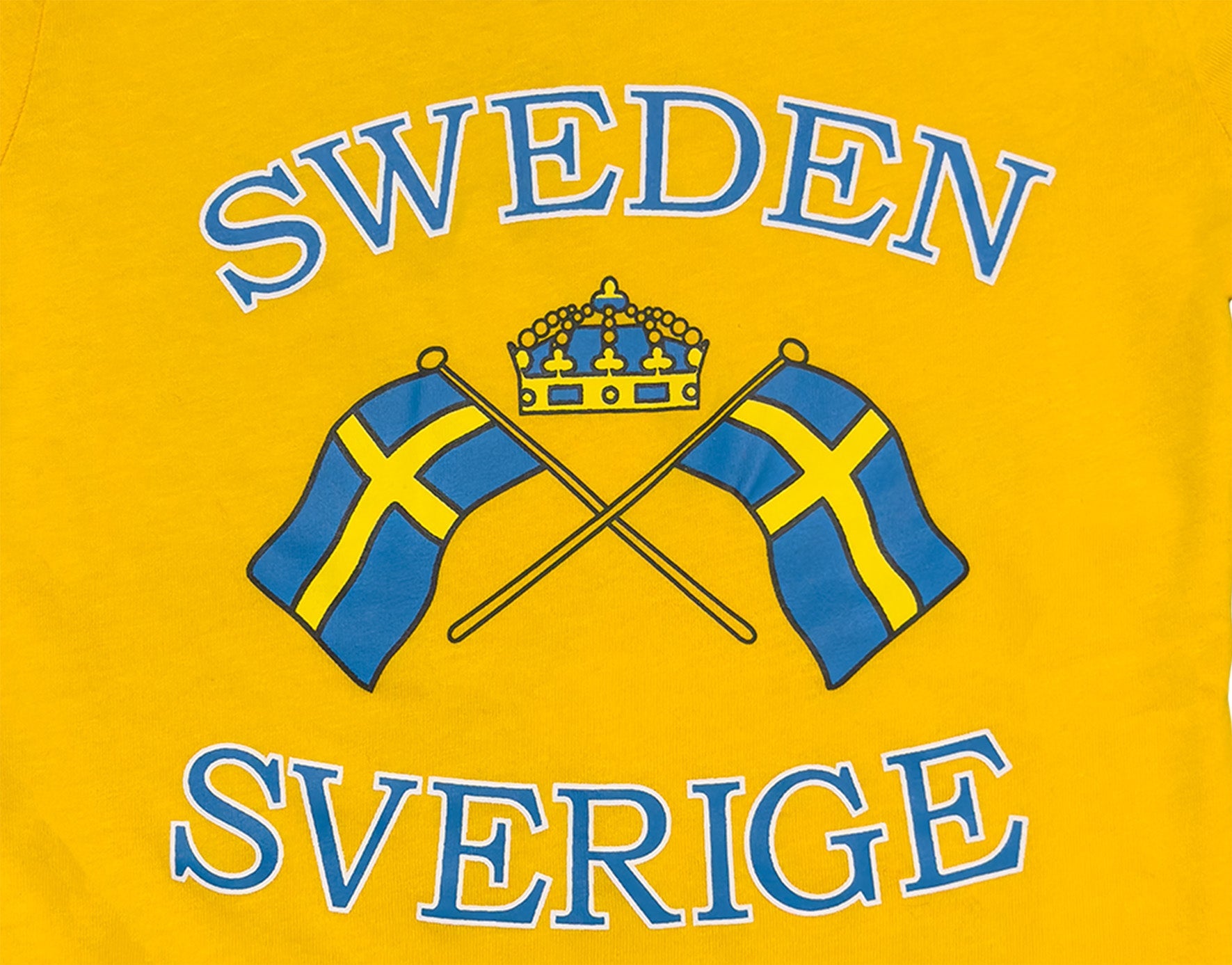 Design Details of Vibrant Kids t-shirt in Yellow featuring crossed Swedish flags and a crown.- Style Council