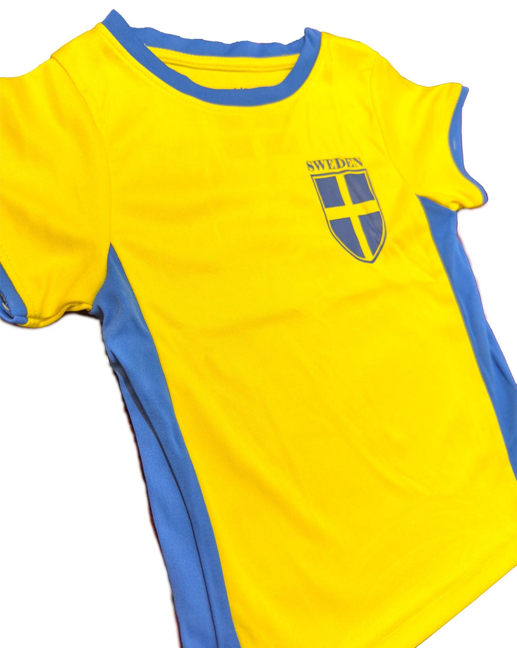 Side View of Bright yellow and blue Sweden football t-shirt for kids with Swedish flag emblem and “SWEDEN” print. - Swedish Kids Tee - Style Council