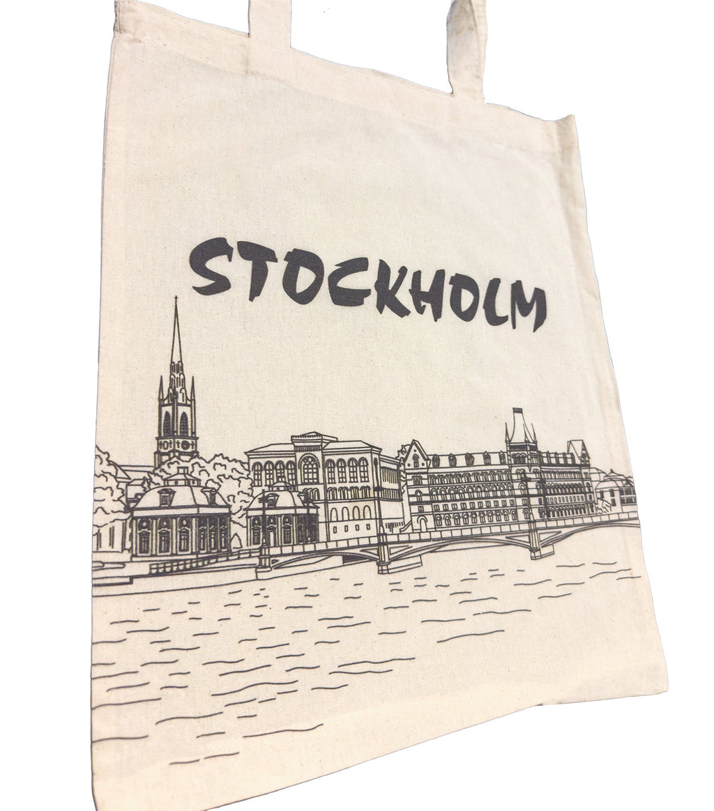 Side angle view of Stockholm skyline tote bag with black line drawing, Scandinavian design – Swedish Souvenir Gift - Style Council